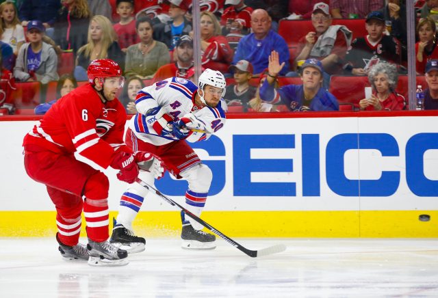 Oct 28, 2016; Raleigh, NC, USA; New York Rangers forward Michael Grabner (40) gets off the shot next to Carolina Hurricanes defensemen Klas Dahlbeck (6) at PNC Arena. The Carolina Hurricanes defeated the New York Rangers 3-2. Mandatory Credit: James Guillory-USA TODAY Sports