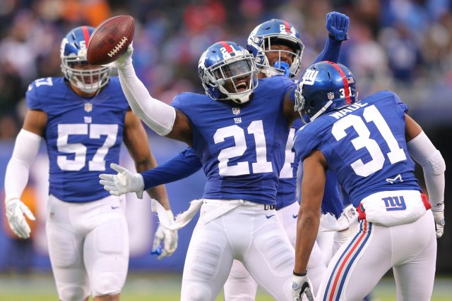 Nov 20, 2016; East Rutherford, NJ, USA; New York Giants safety Landon Collins (21) celebrates with teammates after making a game-ending interception against the Chicago Bears during the fourth quarter at MetLife Stadium. Mandatory Credit: Brad Penner-USA TODAY Sports