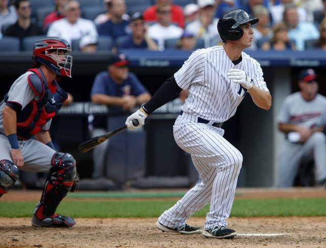 Aug 19, 2015; Bronx, NY, USA; New York Yankees first baseman Greg Bird (31) hits second two run home run in the sixth inning against the Minnesota Twins at Yankee Stadium. Mandatory Credit: Noah K. Murray-USA TODAY Sports