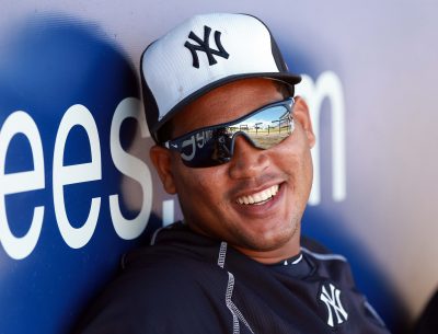 Mar 31, 2016; Tampa, FL, USA; New York Yankees starting pitcher Ivan Nova (47) smiles in the dugout against the St. Louis Cardinals at George M. Steinbrenner Field. Mandatory Credit: Kim Klement-USA TODAY Sports