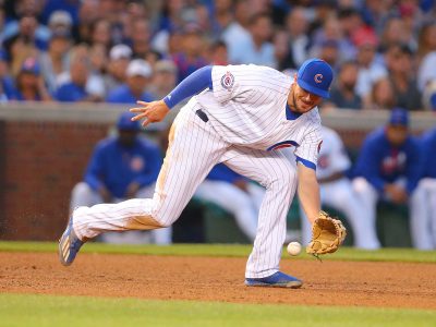 Jul 18, 2016; Chicago, IL, USA; Chicago Cubs third baseman Kris Bryant (17) fields a ground ball off the bat of New York Mets center fielder Juan Lagares (not pictured) during the seventh inning at Wrigley Field. Mandatory Credit: Dennis Wierzbicki-USA TODAY Sports