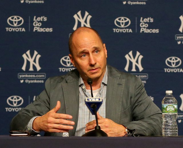 Aug 7, 2016; Bronx, NY, USA; New York Yankees general manager Brian Cashman addresses the media during a press conference announcing the retirement of designated hitter Alex Rodriguez prior to the game between the Cleveland Indians and New York Yankees at Yankee Stadium. Rodriguez will play his last game on Friday August 12, 2016. Mandatory Credit: Andy Marlin-USA TODAY Sports