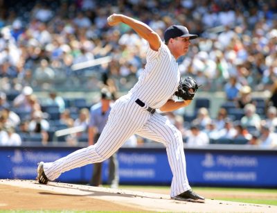 Aug 27, 2016; Bronx, NY, USA; New York Yankees starting pitcher Chad Green (57) pitches against the Baltimore Orioles during the first inning at Yankee Stadium. Mandatory Credit: Andy Marlin-USA TODAY Sports