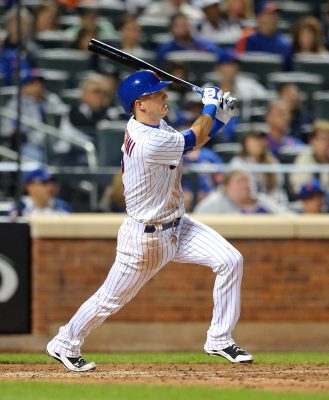 Sep 24, 2016; New York City, NY, USA; New York Mets shortstop Gavin Cecchini (2) hits an RBI double against the Philadelphia Phillies during the sixth inning at Citi Field. The hit was the first of his MLB career. Mandatory Credit: Brad Penner-USA TODAY Sports