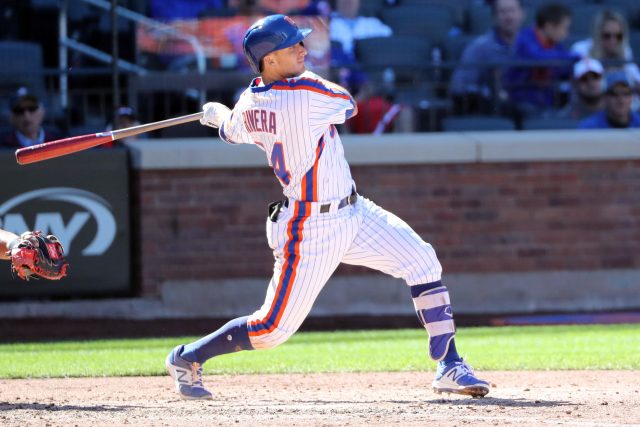 Sep 25, 2016; New York City, NY, USA;  New York Mets third baseman T.J. Rivera (54) hits an RBI single to center during the fifth inning against the Philadelphia Phillies at Citi Field. Mandatory Credit: Anthony Gruppuso-USA TODAY Sports