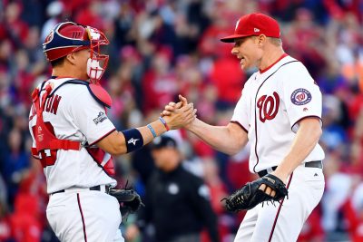 Oct 9, 2016; Washington, DC, USA; Washington Nationals relief pitcher Mark Melancon (43) celebrates with catcher Jose Lobaton (L) after their win against the Los Angeles Dodgers during game two of the 2016 NLDS playoff baseball series at Nationals Park. The Washington Nationals won 5-2.Mandatory Credit: Brad Mills-USA TODAY Sports