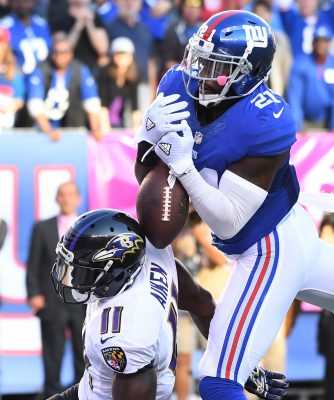 Oct 16, 2016; East Rutherford, NJ, USA; New York Giants strong safety Landon Collins (21) breaks up a 4th quarter pass attempt to Baltimore Ravens wide receiver Kamar Aiken (11) at MetLife Stadium. Mandatory Credit: Robert Deutsch-USA TODAY Sports