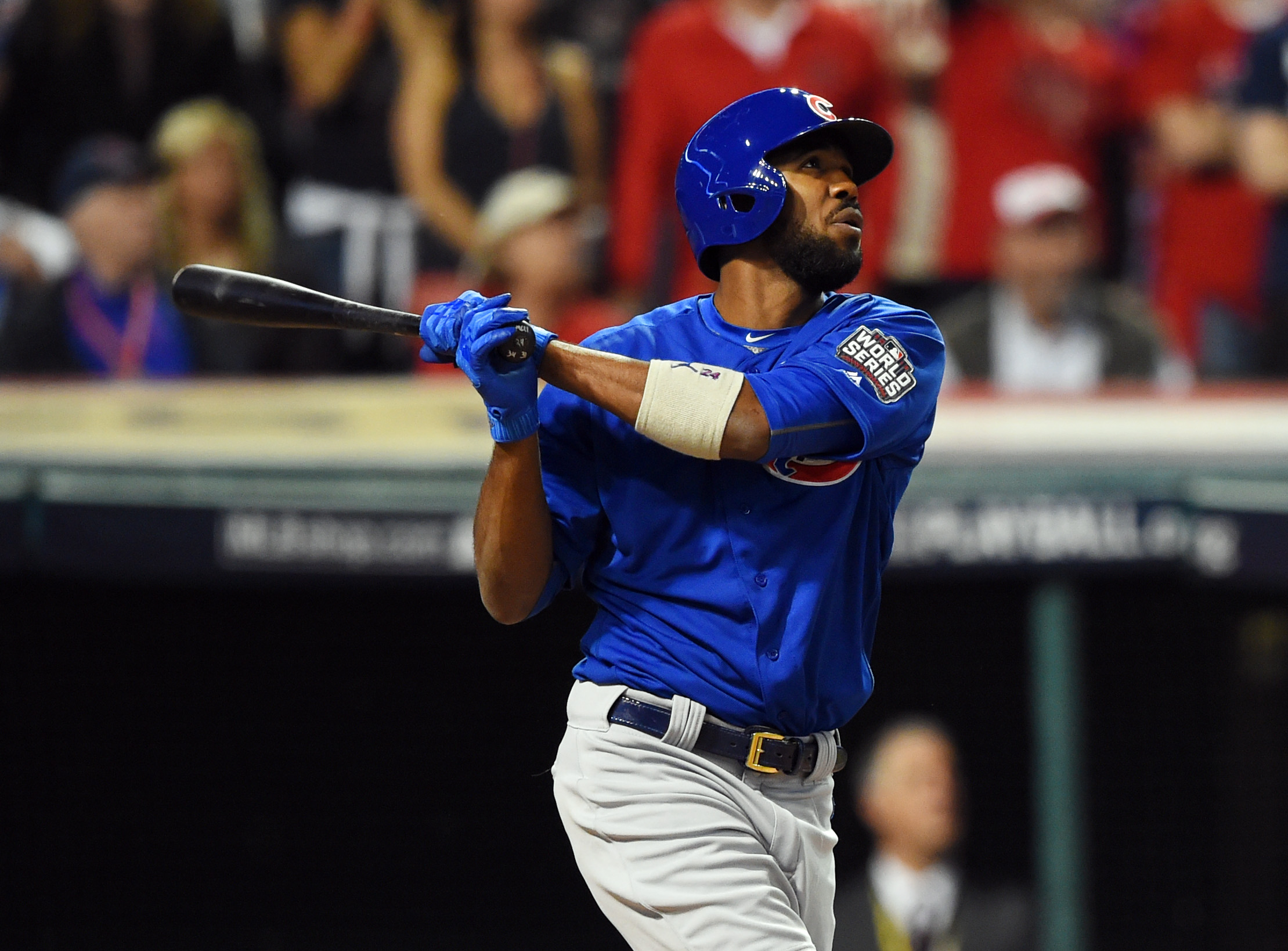 Nov 2, 2016; Cleveland, OH, USA; Chicago Cubs center fielder Dexter Fowler hits a solo home run against the Cleveland Indians in the first inning in game seven of the 2016 World Series at Progressive Field. Mandatory Credit: Tommy Gilligan-USA TODAY Sports