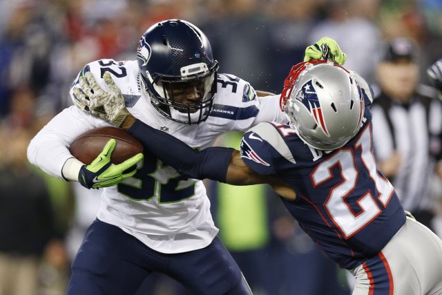 Nov 13, 2016; Foxborough, MA, USA;  Seattle Seahawks running back Christine Michael (32) is tackled by New England Patriots cornerback Malcolm Butler (21) during the fourth quarter at Gillette Stadium.  The Seattle Seahawks won 31-24.  Mandatory Credit: Greg M. Cooper-USA TODAY Sports