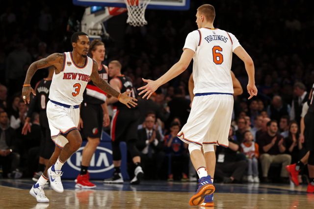 Nov 22, 2016; New York, NY, USA; New York Knicks guard Brandon Jennings (3) celebrates with forward Kristaps Porzingis (6) during the first half against the Portland Trail Blazers at Madison Square Garden. Mandatory Credit: Adam Hunger-USA TODAY Sports