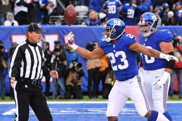 Nov 20, 2016; East Rutherford, NJ, USA; New York Giants running back Rashad Jennings (23) scores a touchdown during the first half against the Chicago Bears at MetLife Stadium. Mandatory Credit: Robert Deutsch-USA TODAY Sports