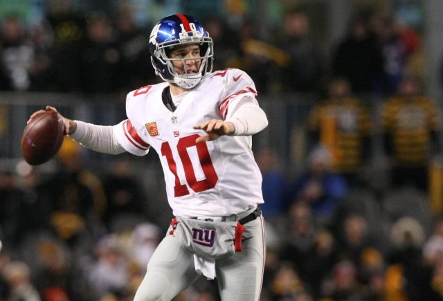 Dec 4, 2016; Pittsburgh, PA, USA; New York Giants quarterback Eli Manning (10) throws a pass against the Pittsburgh Steelers during the second half at Heinz Field. The Steelers won the game, 24-14. Mandatory Credit: Jason Bridge-USA TODAY Sports