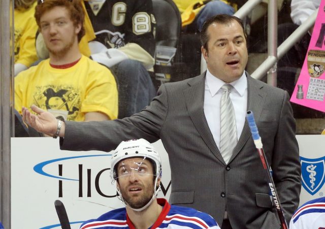 Apr 16, 2016; Pittsburgh, PA, USA; New York Rangers head coach Alain Vigneault gestures behind the bench against the Pittsburgh Penguins in game two of the first round of the 2016 Stanley Cup Playoffs at the CONSOL Energy Center. The Rangers won 4-2 to even the series. Mandatory Credit: Charles LeClaire-USA TODAY Sports