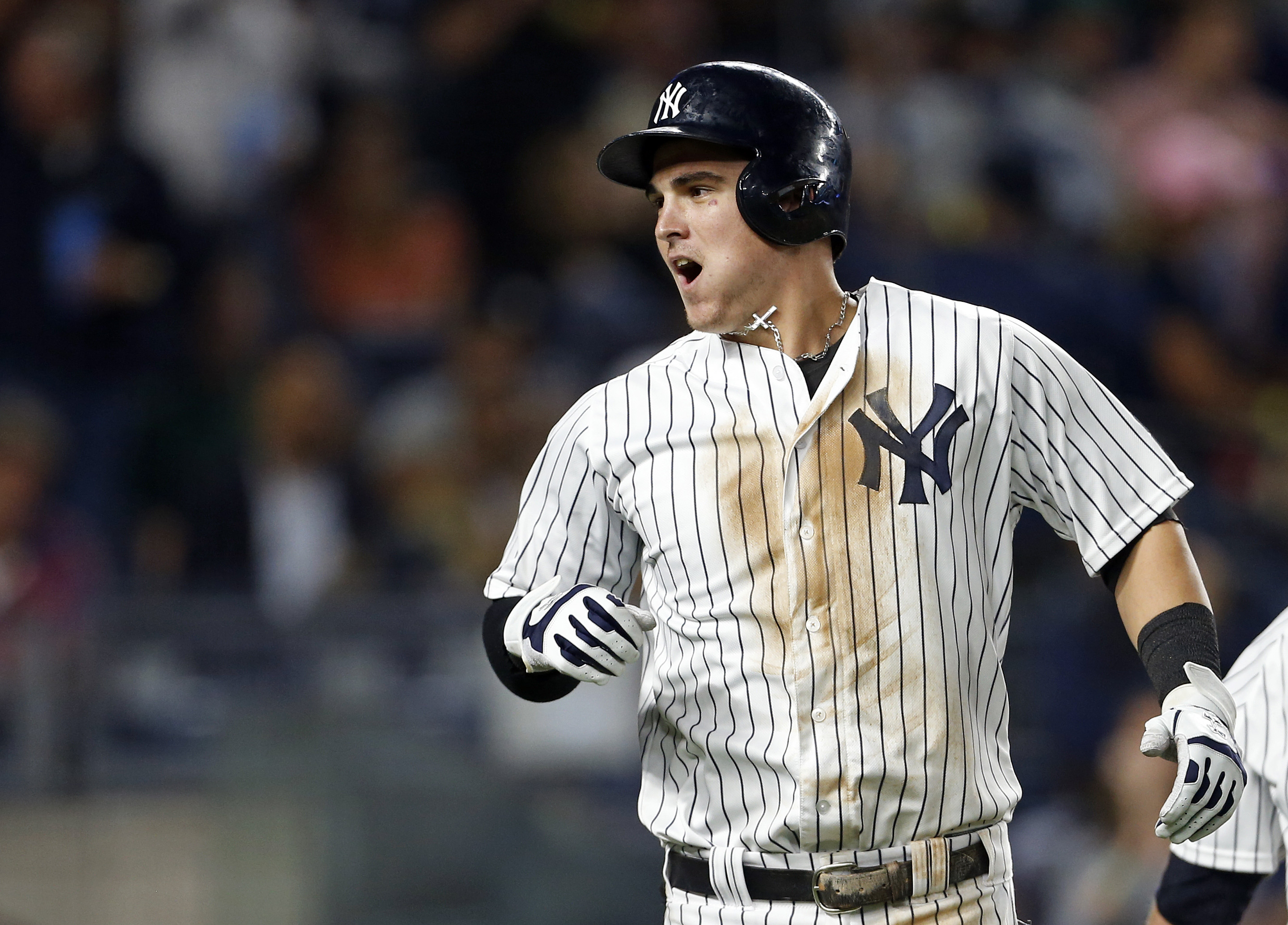 New York Yankees' Greg Bird, right, celebrates with Gary Sanchez