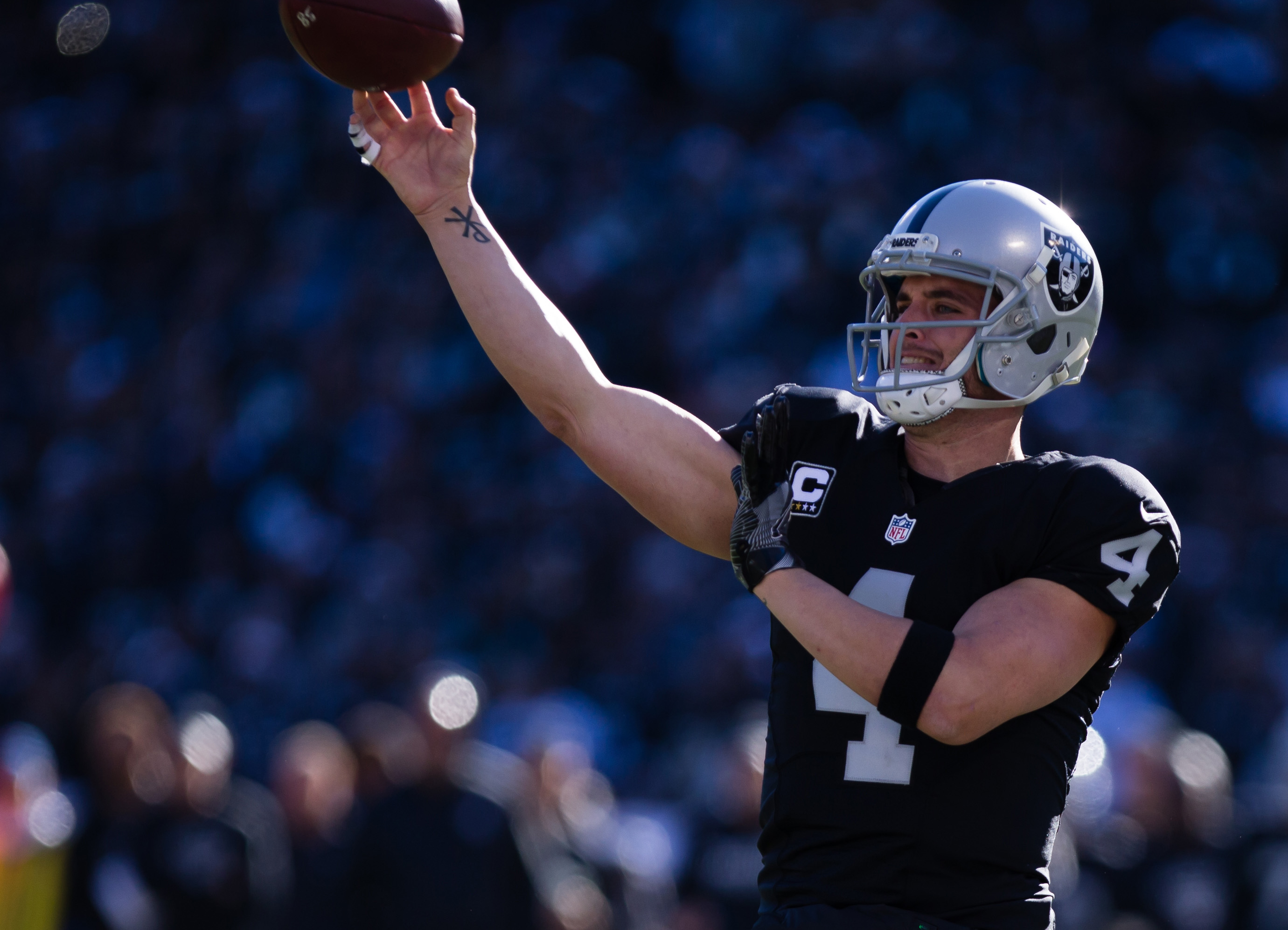 Oakland Raiders quarterback Derek Carr's greatest play comes off the field 