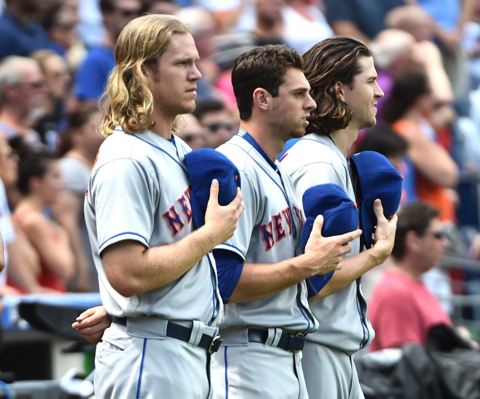 From left, New York Mets starting pitcher Bartolo Colon (40), Mets relief  pitcher Jeurys Familia (27), Mets starting pitcher Noah Syndergaard (34)  and Mets center fielder Yoenis Cespedes (52) pose with their