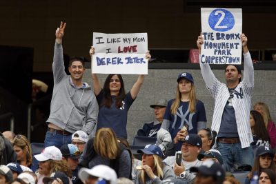 Derek Jeter unveils the Monument Park Plaque with Hannah Jeter at