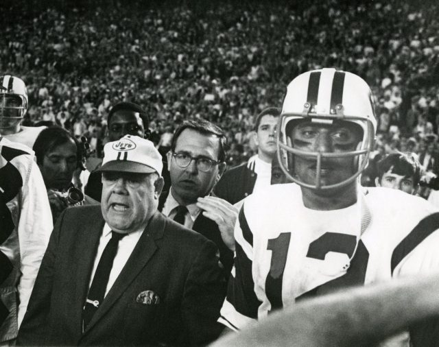 New York Jet quarterback Joe Namath stands with bowed head after being  injured in the first quarter of the Jets-Colt game at Memorial Stadium on  Sept. 23, 1973, in Baltimore, Maryland. Namath