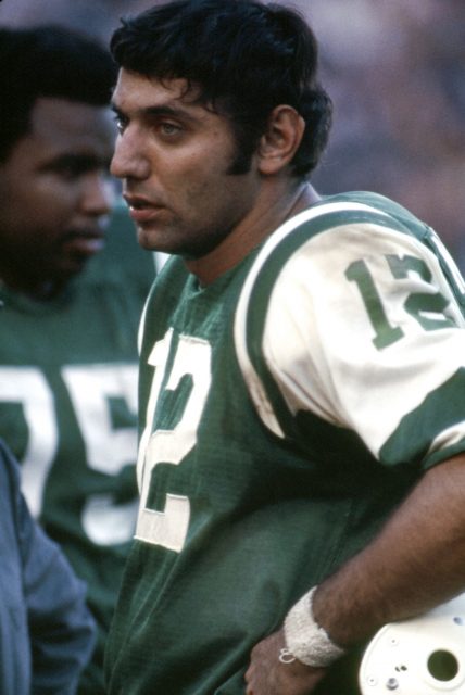 New York Jet quarterback Joe Namath stands with bowed head after being  injured in the first quarter of the Jets-Colt game at Memorial Stadium on  Sept. 23, 1973, in Baltimore, Maryland. Namath