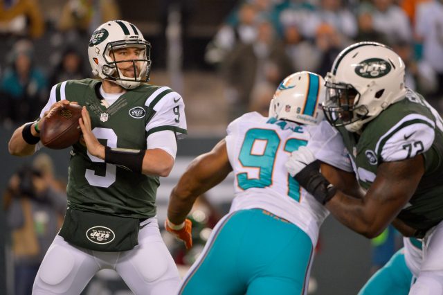 New York Jets Greg McElroy runs out of the pocket in the first quarter  against the San Diego Chargers in week 16 of the NFL season at MetLife  Stadium in East Rutherford