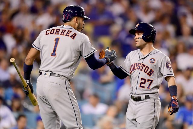 Houston Astros Carlos Correa celebrates with Jose Altuve after