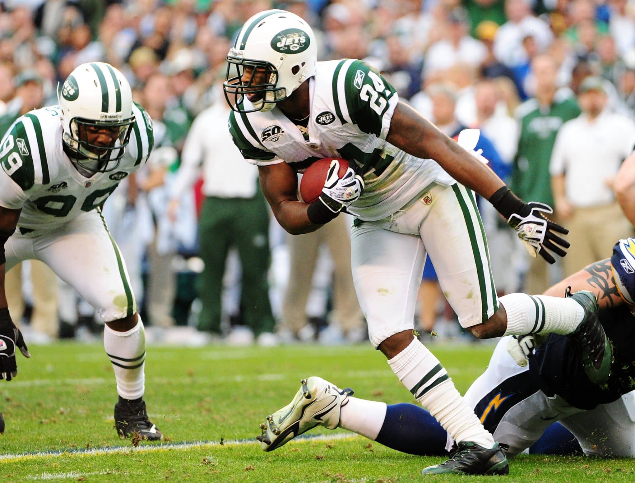 New York Jets corner back Darrelle Revis (24) celebrates after making an  interception in the third quarter against the San Diego Chargers at the  2010 AFC divisional playoff game at Qualcomm Stadium