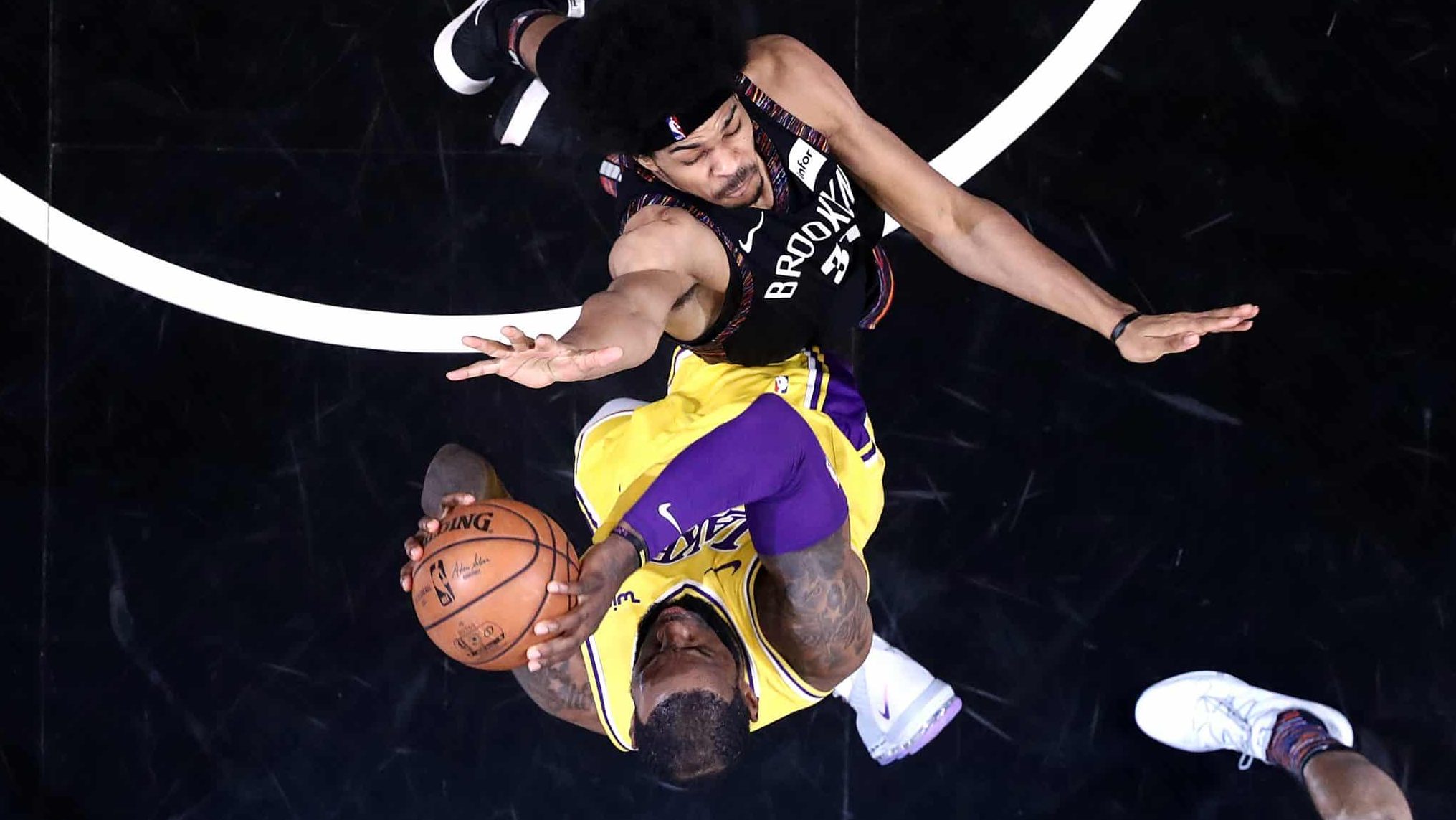 LeBron James of the Los Angeles Lakers dunks against the Brooklyn