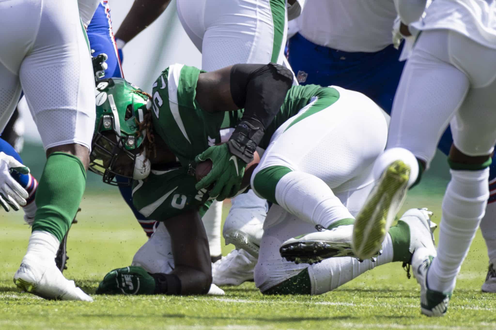 EAST RUTHERFORD, NJ - SEPTEMBER 08: C.J. Mosley #57 of the New York Jets picks up a fumbled snap by the Buffalo Bills during the second quarter at MetLife Stadium on September 8, 2019 in East Rutherford, New Jersey.