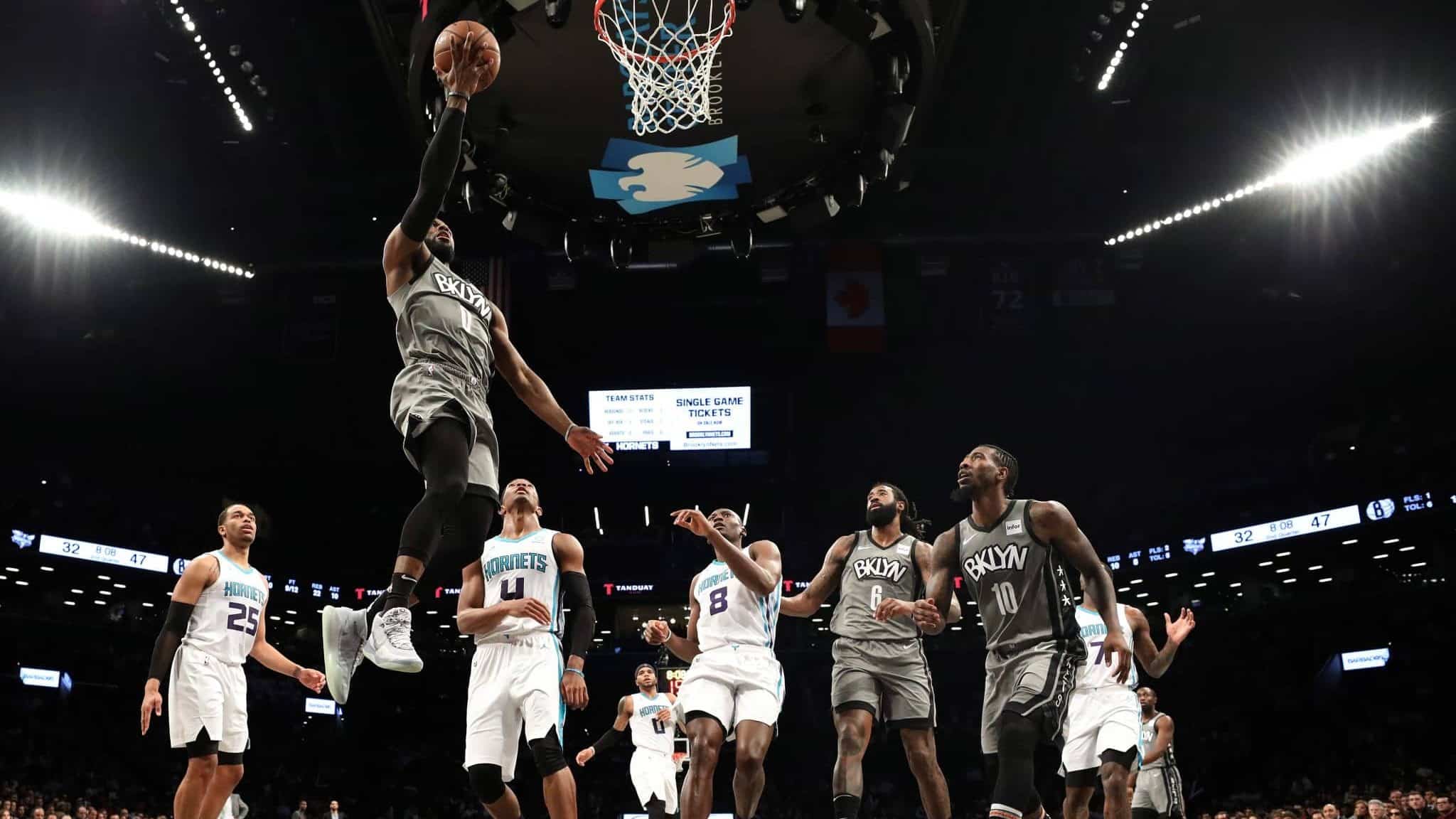NEW YORK, NEW YORK - DECEMBER 11: David Nwaba #0 of the Brooklyn Nets goes in for a layup during the first half of their game against the Charlotte Hornets at Barclays Center on December 11, 2019 in New York City. NOTE TO USER: User expressly acknowledges and agrees that, by downloading and or using this photograph, User is consenting to the terms and conditions of the Getty Images License Agreement.