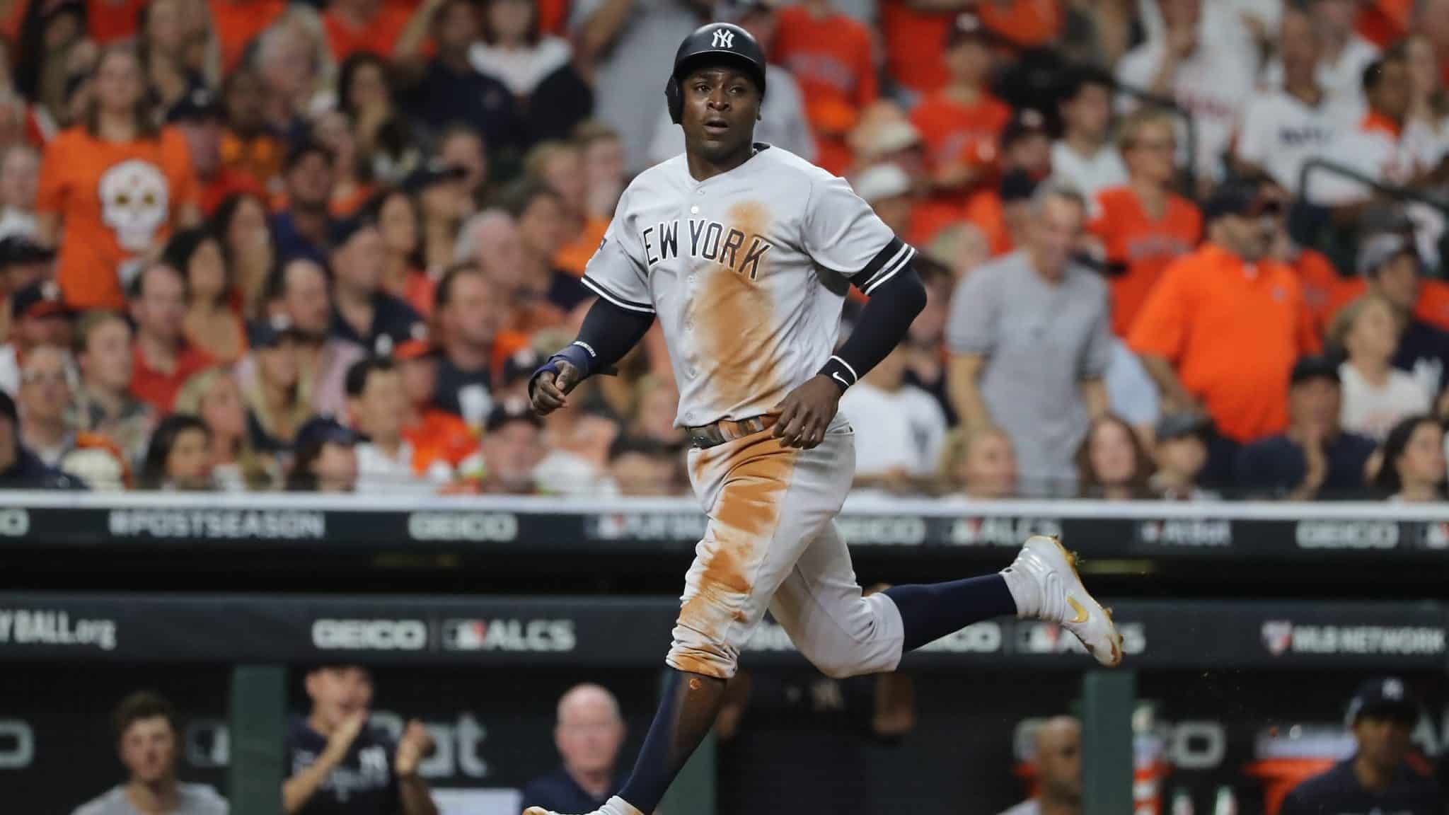 HOUSTON, TEXAS - OCTOBER 19: Didi Gregorius #18 of the New York Yankees scores a run against the Houston Astros during the second inning in game six of the American League Championship Series at Minute Maid Park on October 19, 2019 in Houston, Texas.