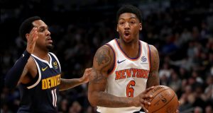 DENVER, COLORADO - DECEMBER 15: Elfrid Payton #6 of the New York Knicks drives against Monte Morris #11 of the Denver Nuggets in the first quarter at the Pepsi Center on December 15, 2019 in Denver, Colorado. NOTE TO USER: User expressly acknowledges and agrees that, by downloading and or using this photograph, User is consenting to the terms and conditions of the Getty Images License Agreement.