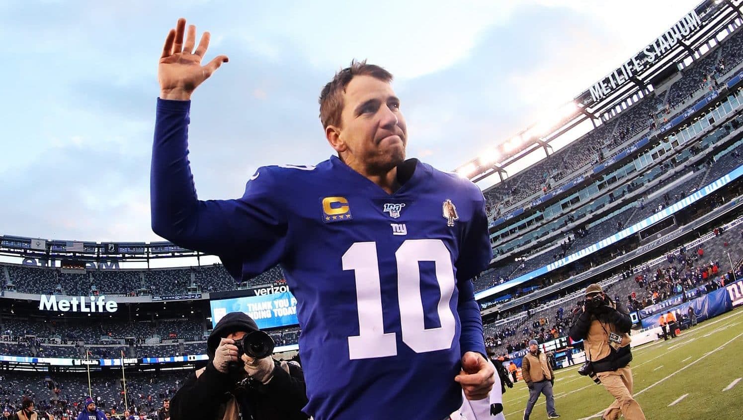 EAST RUTHERFORD, NEW JERSEY - DECEMBER 15: Eli Manning #10 of the New York Giants waves to the crowd after his 31-13 win against the Miami Dolphins during their game at MetLife Stadium on December 15, 2019 in East Rutherford, New Jersey.