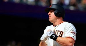 SAN FRANCISCO, CALIFORNIA - APRIL 27: Erik Kratz #5 of the San Francisco Giants celebrates a solo home run during the ninth inning against the New York Yankees at Oracle Park on April 27, 2019 in San Francisco, California.