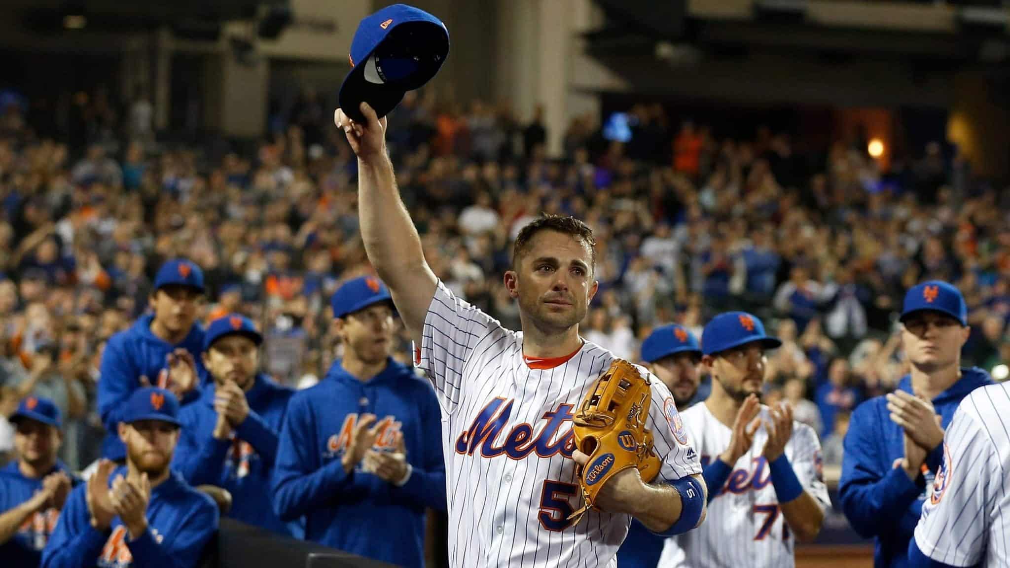 NEW YORK, NY - SEPTEMBER 29: (EDITORS NOTE: Retransmission with alternate crop.) David Wright #5 of the New York Mets acknowledges the crowd as he is removed from the final game of his career during the fifth inning against the Miami Marlins at Citi Field on September 29, 2018 in the Flushing neighborhood of the Queens borough of New York City.