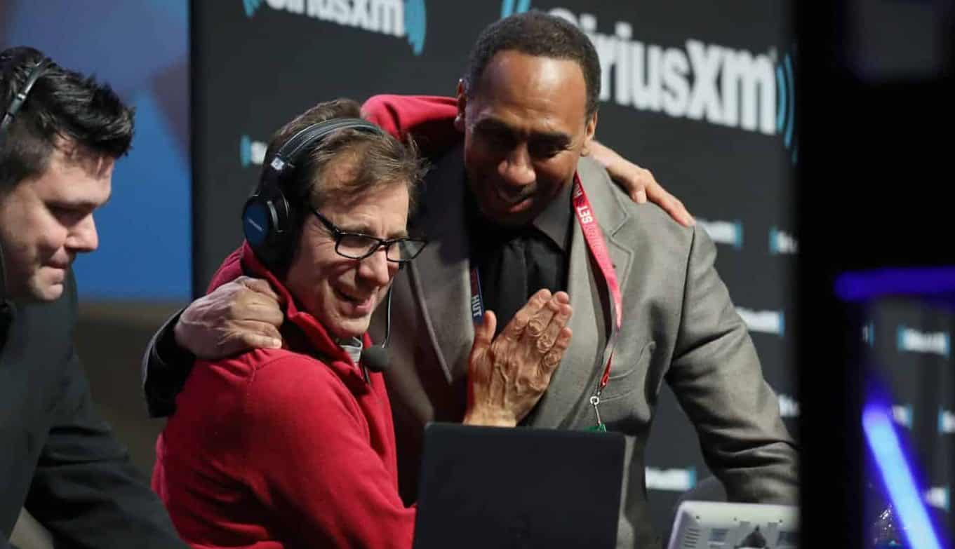 ATLANTA, GEORGIA - JANUARY 31: Chris Russo and Stephen A. Smith attend SiriusXM at Super Bowl LIII Radio Row on January 31, 2019 in Atlanta, Georgia.