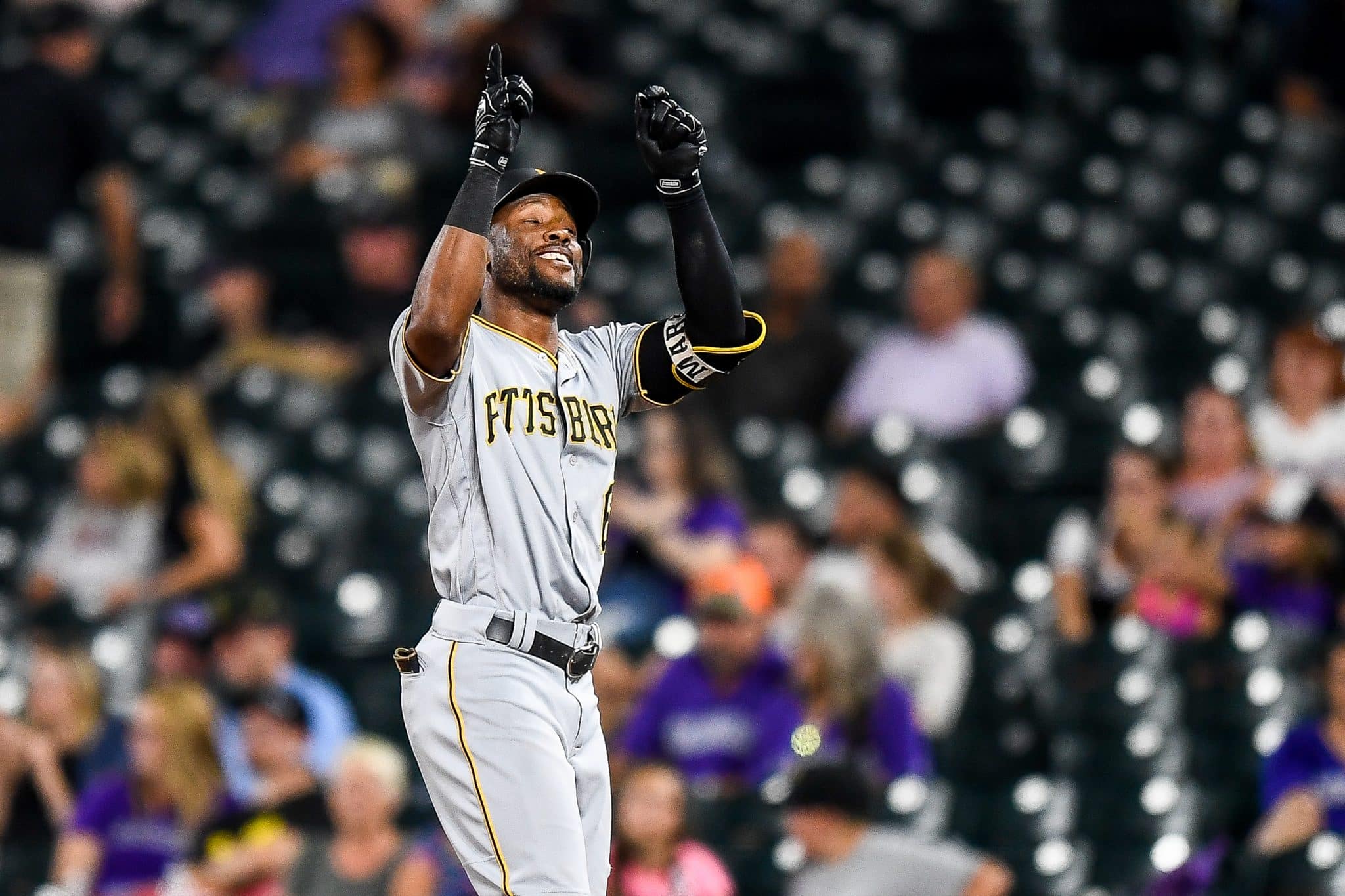 DENVER, CO - AUGUST 31: Starling Marte #6 of the Pittsburgh Pirates celebrates after a ninth inning run-scoring single against the Colorado Rockies at Coors Field on August 31, 2019 in Denver, Colorado.