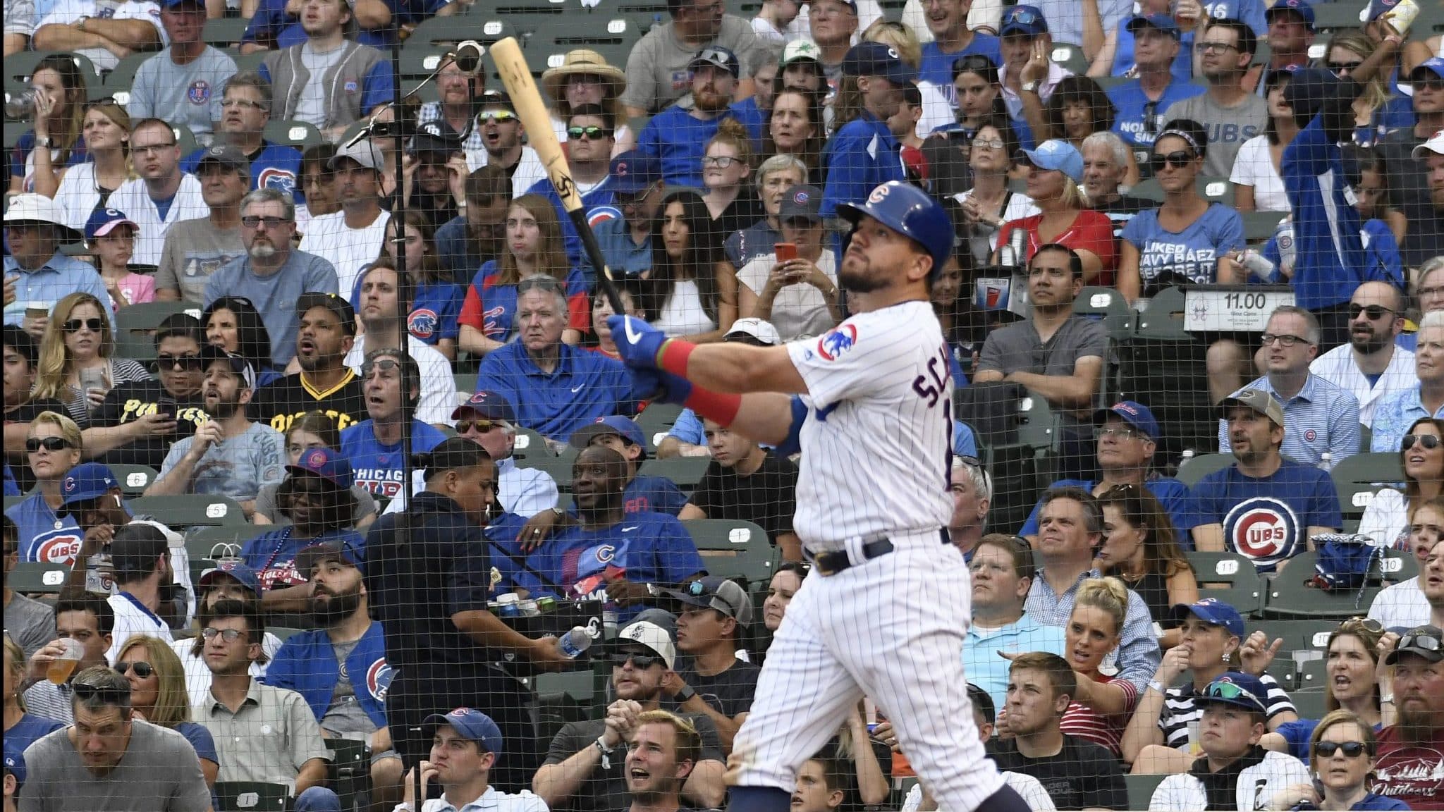 CHICAGO, ILLINOIS - SEPTEMBER 15: Kyle Schwarber #12 of the Chicago Cubs watches his two-run home run against the Pittsburgh Pirates during the seventh inning at Wrigley Field on September 15, 2019 in Chicago, Illinois.