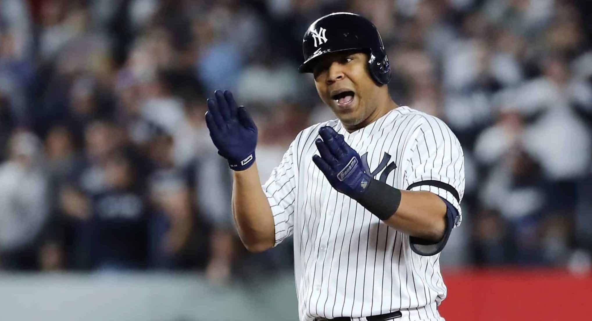 NEW YORK, NEW YORK - OCTOBER 15: Edwin Encarnacion #30 of the New York Yankees celebrates hitting a double during the fifth inning against the Houston Astros in game three of the American League Championship Series at Yankee Stadium on October 15, 2019 in New York City.