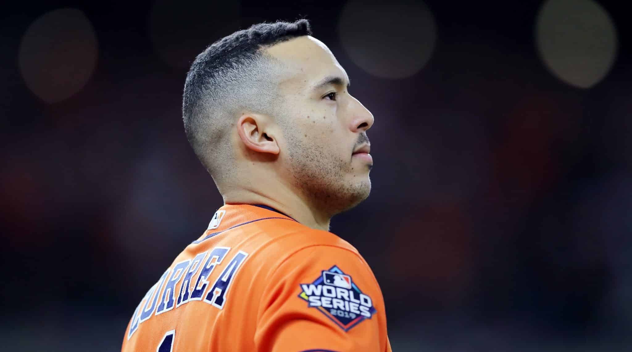 HOUSTON, TEXAS - OCTOBER 30: Carlos Correa #1 of the Houston Astros reacts after hitting an RBI single against the Washington Nationals during the fifth inning in Game Seven of the 2019 World Series at Minute Maid Park on October 30, 2019 in Houston, Texas.