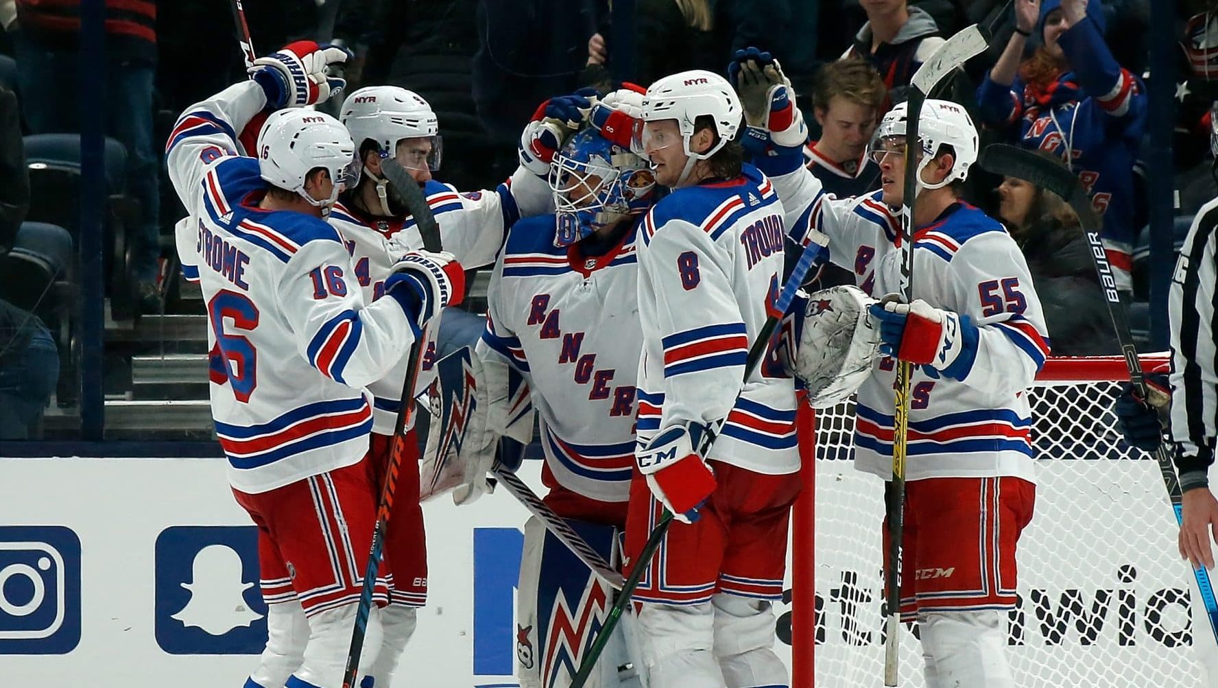 COLUMBUS, OH - DECEMBER 5: Alexandar Georgiev #40 of the New York Rangers is congratulated by his teammates after defeating the Columbus Blue Jackets 3-2 on December 5, 2019 at Nationwide Arena in Columbus, Ohio.