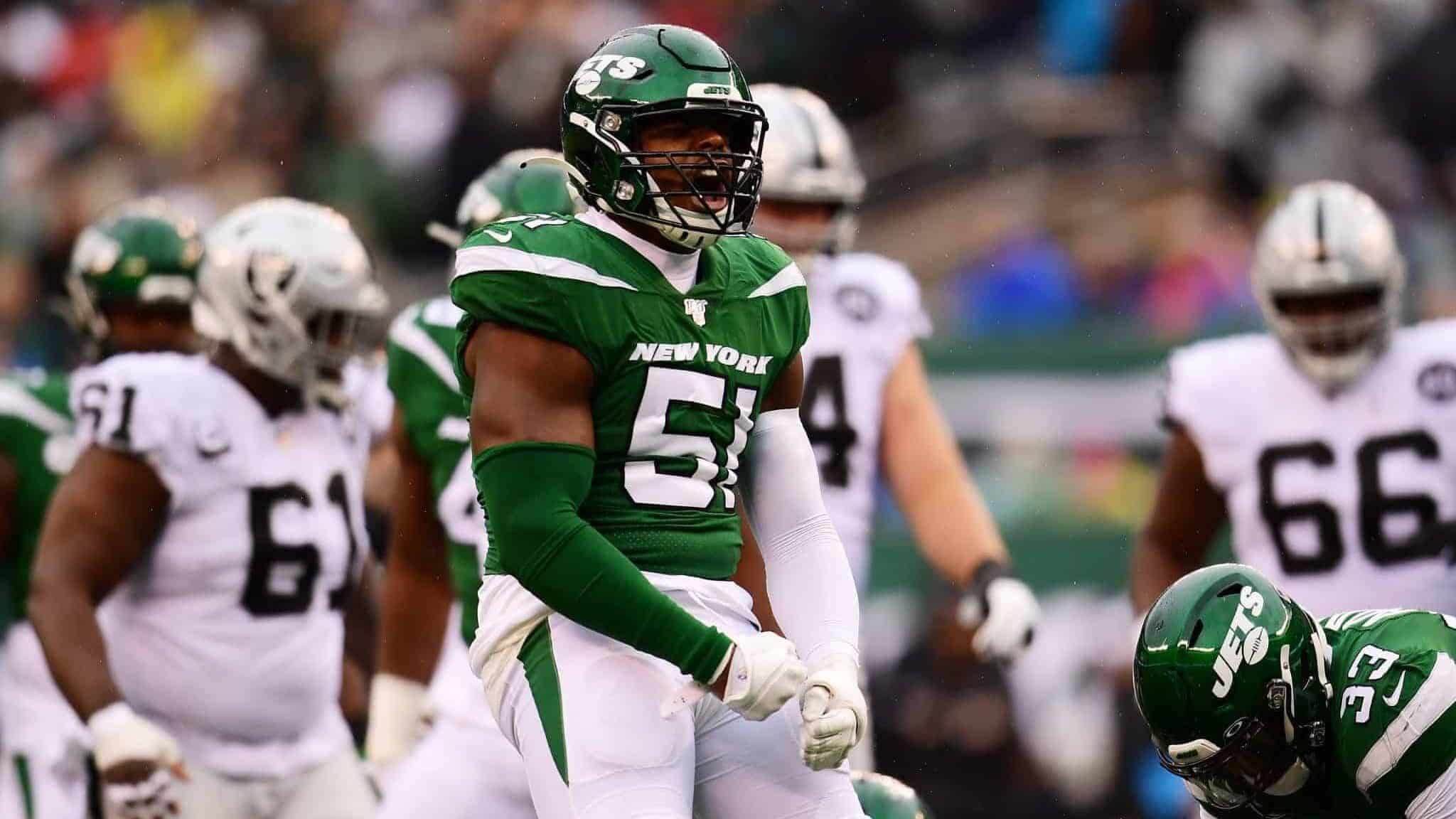 EAST RUTHERFORD, NEW JERSEY - NOVEMBER 24: Brandon Copeland #51 of the New York Jets reacts during the second quarter of their game against the Oakland Raiders at MetLife Stadium on November 24, 2019 in East Rutherford, New Jersey.