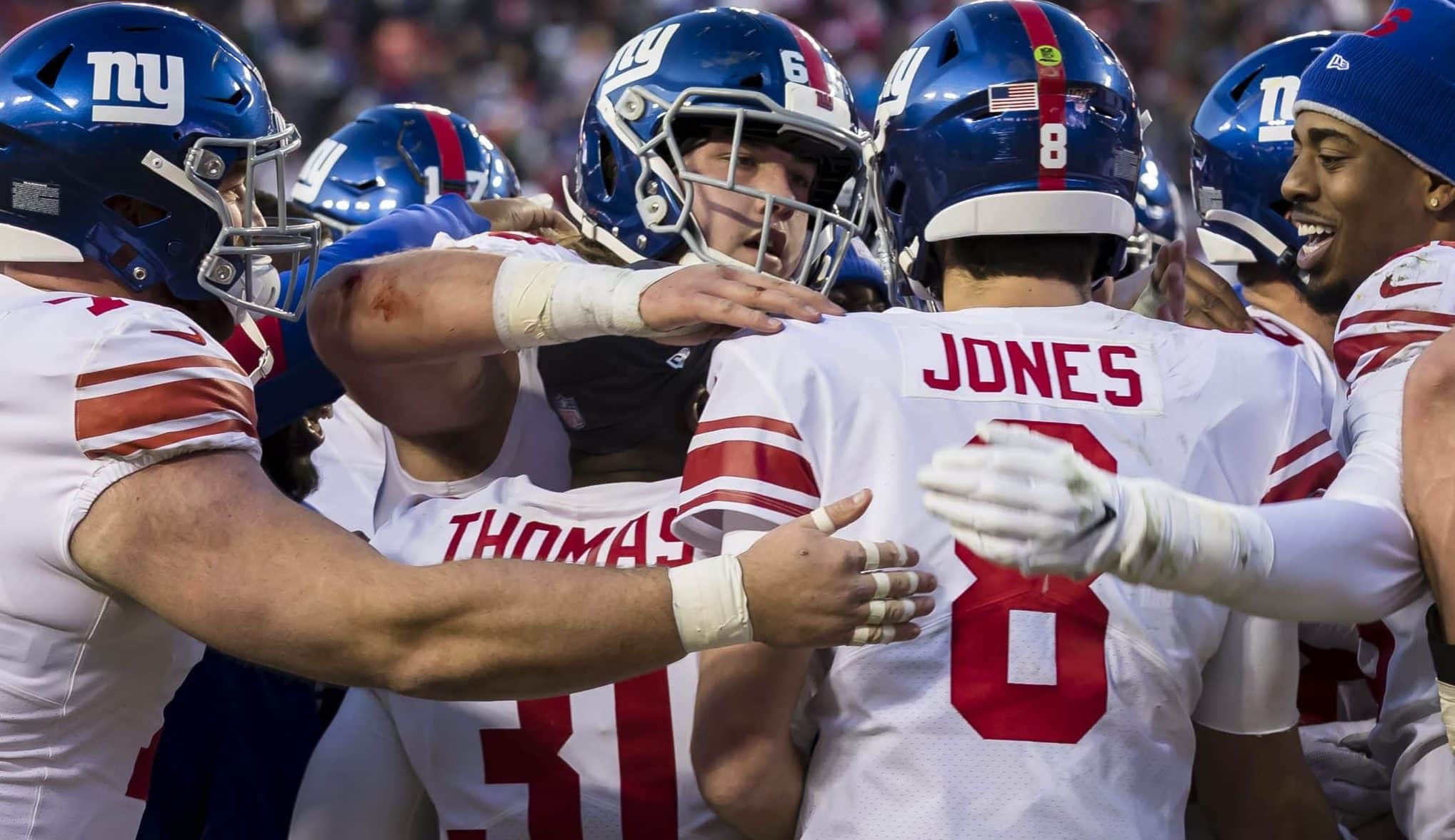 LANDOVER, MD - DECEMBER 22: Daniel Jones #8 of the New York Giants celebrates with teammates after throwing the game winning touchdown against the Washington Redskins during overtime at FedExField on December 22, 2019 in Landover, Maryland.