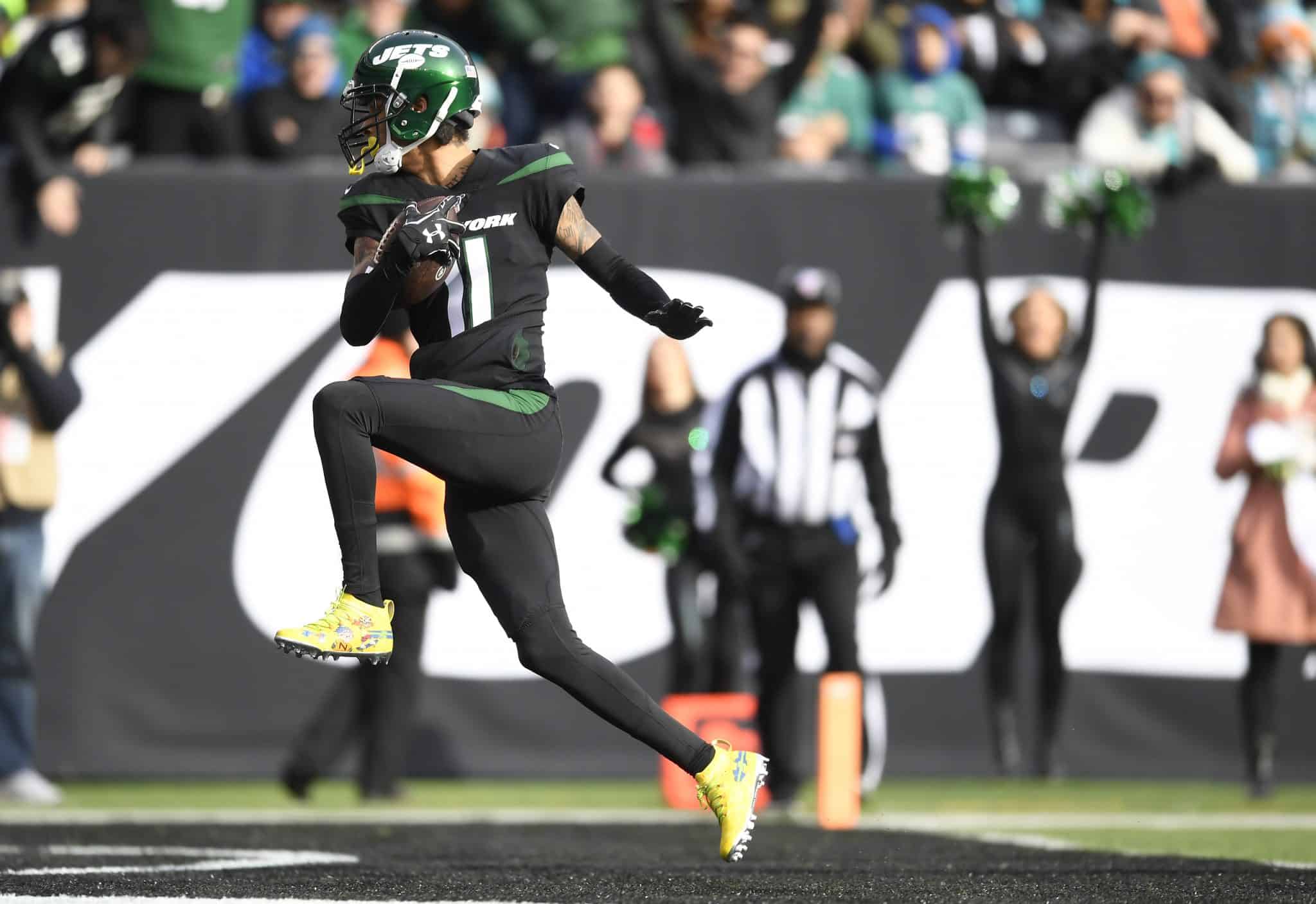 EAST RUTHERFORD, NEW JERSEY - DECEMBER 08: Robby Anderson #11 of the New York Jets runs the ball into the end zone for a touchdown during the first half of the game against the Miami Dolphins at MetLife Stadium on December 08, 2019 in East Rutherford, New Jersey.