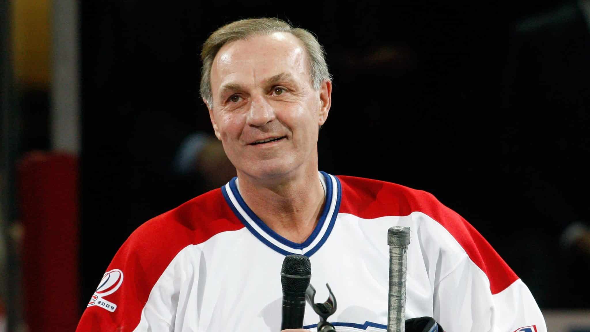 MONTREAL- DECEMBER 4: Former Montreal Canadien Guy Lafleur speaks to fans during the Centennial Celebration ceremonies prior to the NHL game between the Montreal Canadiens and Boston Bruins on December 4, 2009 at the Bell Centre in Montreal, Quebec, Canada. The Canadiens defeated the Bruins 5-1.