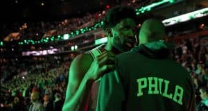 BOSTON, MASSACHUSETTS - DECEMBER 12: Joel Embiid #21 of the Philadelphia 76ers talks with Al Horford #42 before the game against the Boston Celtics at TD Garden on December 12, 2019 in Boston, Massachusetts. NOTE TO USER: User expressly acknowledges and agrees that, by downloading and or using this photograph, User is consenting to the terms and conditions of the Getty Images License Agreement.