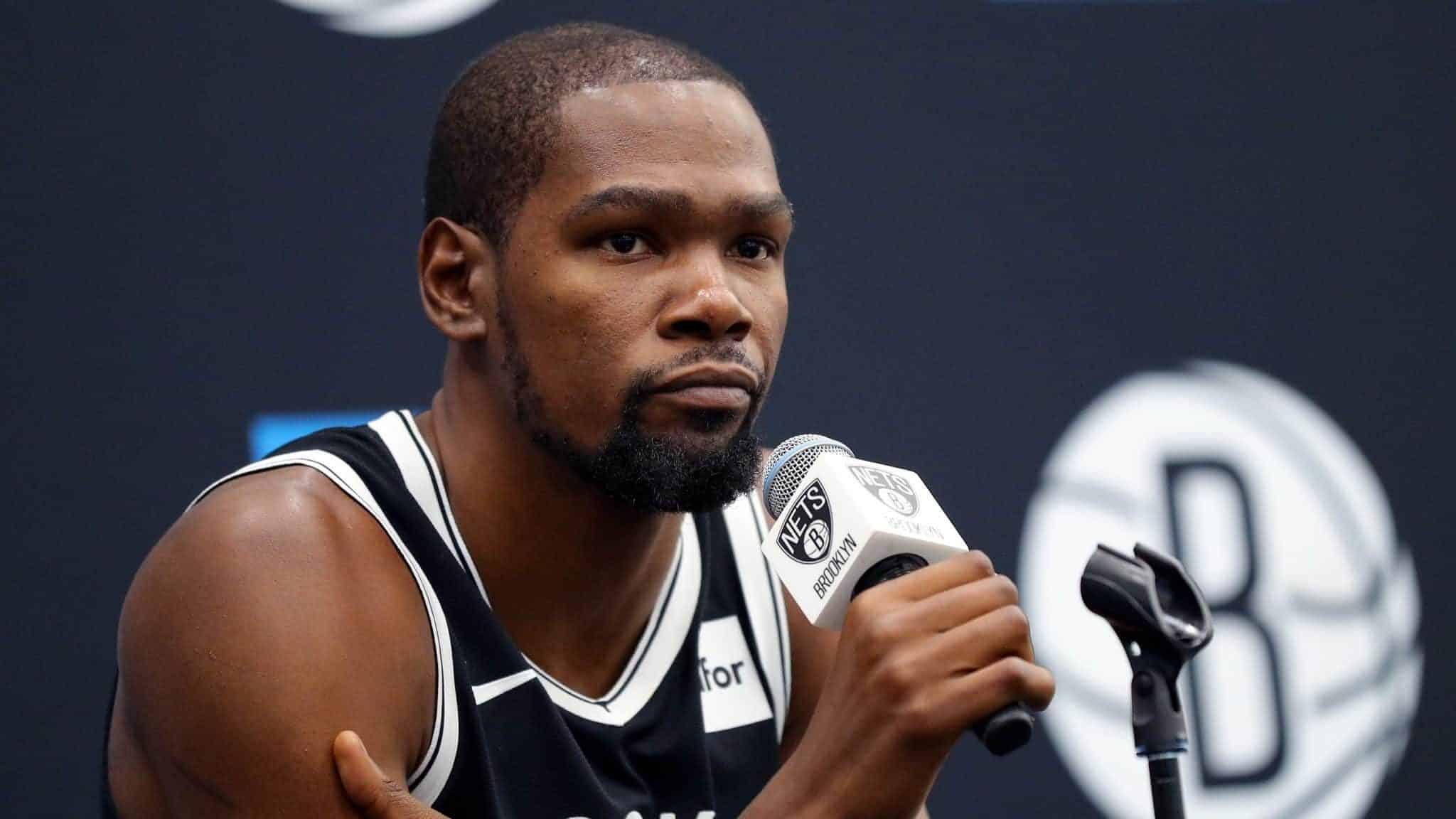 NEW YORK, NEW YORK - SEPTEMBER 27: Kevin Durant #7 of the Brooklyn Nets speaks to media during Brooklyn Nets Media Day at HSS Training Center on September 27, 2019 in the Brooklyn Borough of New York City. NOTE TO USER: User expressly acknowledges and agrees that, by downloading and or using this photograph, User is consenting to the terms and conditions of the Getty Images License Agreement.