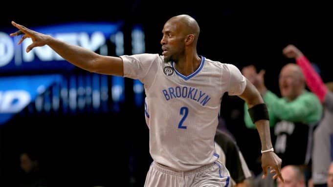 NEW YORK, NY - FEBRUARY 06: Kevin Garnett #2 of the Brooklyn Nets celebrates a shot in the first half against the New York Knicks at the Barclays Center on February 6, 2015 in the Brooklyn borough of New York City. NOTE TO USER: User expressly acknowledges and agrees that, by downloading and/or using this photograph, user is consenting to the terms and conditions of the Getty Images License Agreement.