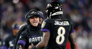 BALTIMORE, MARYLAND - DECEMBER 12: Head coach John Harbaugh of the Baltimore Ravens and quarterback Lamar Jackson #8 celebrate a touchdown in the third quarter of the game against the New York Jets at M&T Bank Stadium on December 12, 2019 in Baltimore, Maryland.