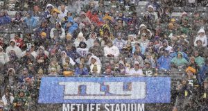 EAST RUTHERFORD, NEW JERSEY - DECEMBER 01: Fans endure bad weather during the New York Giants and the Green Bay Packers game at MetLife Stadium on December 01, 2019 in East Rutherford, New Jersey.
