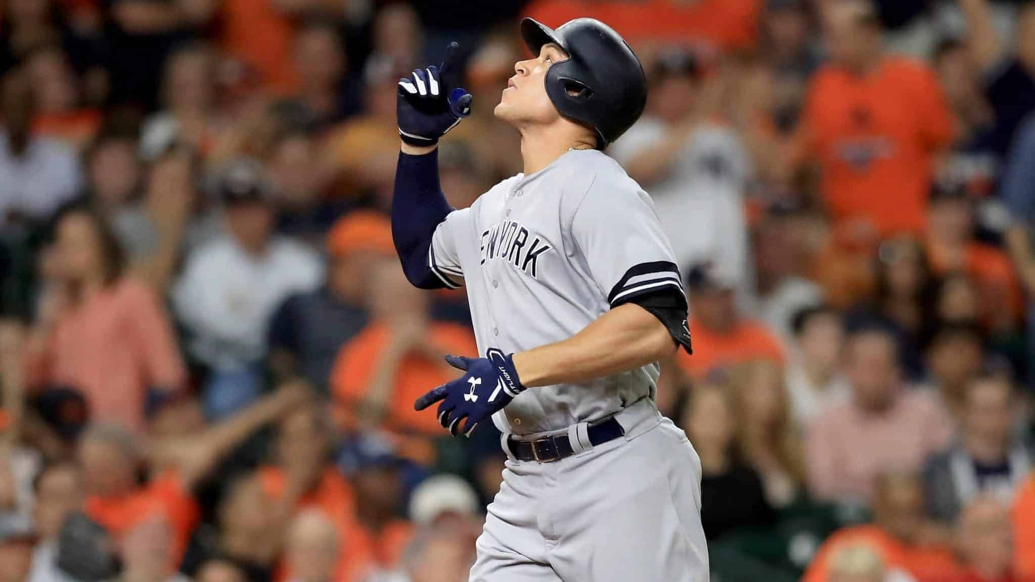 HOUSTON, TX - OCTOBER 20: Aaron Judge #99 of the New York Yankees celebrates after hitting a solo home run against Brad Peacock #41 of the Houston Astros during the eighth inning in Game Six of the American League Championship Series at Minute Maid Park on October 20, 2017 in Houston, Texas.